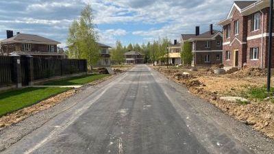 Асфальтирование дорог первой очереди